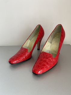 Vintage red fake leather high heels MATERIAL man made materials MAKER: Johnasen Lewis designs CONDITION great vintage condition black scuffing on toes SIZE US 6.5 N toe to heel 9 in. heel height 3 in. width 3 in. SHIPPING: standard priority shipped with tracking number included we ship overseas will ship next day if requested for an additional charge. Retro Heels With Red Sole And Pointed Toe, Retro Pointed Toe Heels With Red Sole, Vintage Fitted Court Shoes With Padded Heel, Vintage Fitted Heels With Padded Heel, Vintage Heels With Red Sole And Round Toe, Vintage Red Block Heel Heels, Red Fitted Court Shoes With Sculpted Heel, Retro Square Toe Heels For Evening, Fitted Red Court Shoes With Sculpted Heel