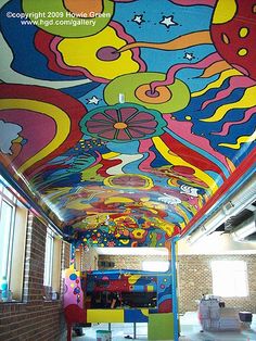 the ceiling is painted with colorful designs and colors