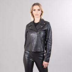 Black lambskin jacket with a collar.  The jacket has a collar, exterior side pockets, and also a zipper closure.  This garment will stand out with its unique color and warmth.  The jacket manufactures in our company in Greece with high-quality lambskin. Leather: Lamb Color: Black Length: 55 - 60 cm (21,6 - 23,6 in) Collar: Yes Exterior pockets: Yes Lining: 100% Polyester Care: Specialist clean Fall Leather Biker Jacket With Lapel Collar, Leather Biker Jacket With Lapel Collar For Fall, Winter Workwear Leather Jacket With Asymmetrical Zip, Winter Leather Jacket With Asymmetrical Zip For Work, Asymmetrical Zip Leather Jacket For Work In Winter, Leather Biker Jacket With Lapel Collar For Winter, Winter Leather Biker Jacket With Zipper, Winter Biker Outerwear With Asymmetrical Zip, Biker Style Long Sleeve Outerwear With Padded Collar