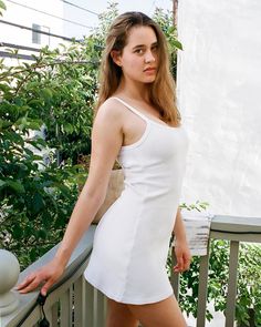 Summer Dresses. That’s Los Angeles. Rachel is shown here wearing our RHR318GD Heavy Rib Spaghetti Mini Dress in White. This 100% cotton heavy rib mini dress features thickness and structure for a playful, yet classic look. Made in Los Angeles by experienced workers earning fair wages. #thatslosangeles #losangelesapparel #dovcharney #basics #comfort #classics #minidress #dress #madeinusa Lace Knitwear, La Apparel, 2023 Beach, Preppy Dress, Casual Mini Dress, La Outfits, Ribbed Mini Dress, White Short Dress, Form Fitting Dress