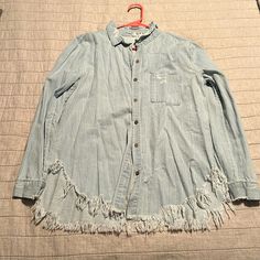 Women’s Distressed Denim Button Up From Boutique Brand New Condition, No Flaws Size Medium Longer In The Back, Covers Butt (I’m 5’5”) Denim Blue Button-up Top With Frayed Hem, Button-up Denim Top With Frayed Hem, Casual Light Wash Denim Top With Frayed Hem, Casual Denim Button-up Top With Frayed Hem, Summer Distressed Button-up Denim Top, Summer Distressed Denim Button-up Top, Distressed Button-up Denim Top, Distressed Washed Blue Button-up Denim Top, Washed Blue Distressed Button-up Denim Top