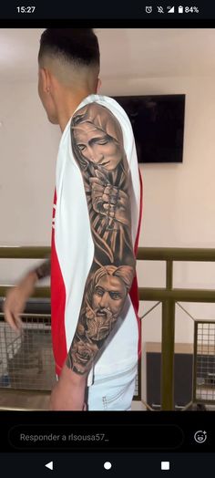 a man with a tattoo on his arm