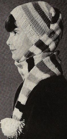 a woman wearing a knitted hat and scarf