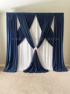 a blue and white drape curtain in a living room