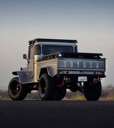 an off - road vehicle with the word toyota on it's front bumpers