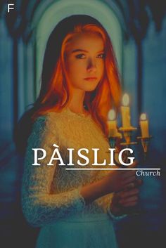 a woman holding candles in her hands with the words, paisig church on it