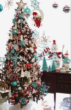 a decorated christmas tree in a living room