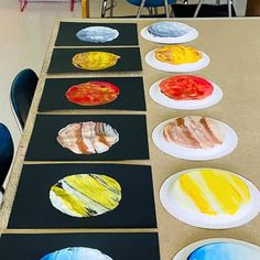 some paper plates with different designs on them