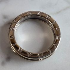 A Mens Estate 18k White Gold Bvlgari Wedding Band Ring. The Ring Weighs 8.0g And Is A Size 8.5. The Width Of The Ring Is About 3/16". Marked On The Inside Of The Band As Well. A Great Deigner Ring. This Makes A Lovely Gift For That Someone Special. If Any Questions, Please Ask. Be Sure To Check Out Our Other Items. Thank You. Wedding Band Ring, Mens Accessories Jewelry, Wedding Ring Bands, Band Ring, Lovely Gift, Wedding Band, Band Rings, Wedding Bands, Mens Accessories