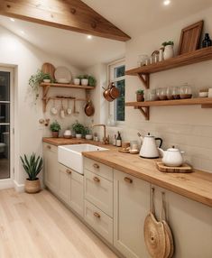 a kitchen filled with lots of wooden counter tops