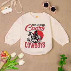 Rodeo Western Cowboy Baby Romper Sweatshirt, Wild West Baby Bodysuit, Rodeo Western Romper, Baby Boy Clothes - Handmade - Ships from USA - Materials: 100% CPSIA Compliant and Ethically Made material Light fabric (5.0 oz/yd² (170 g/m Crafted with soft, breathable fabric, this romper ensures your baby stays comfortable through playtimes and nap times alike. Featuring charming designs suitable for all babies, our romper is as adorable as it is practical. Quick Sizing Tip Our rompers are available i Casual Long Sleeve Onesie With Graphic Print, Casual Long Sleeve Graphic Print Onesie, Western Romper, Nap Times, M Craft, Cowboy Baby, Baby Cowboy, Boy Clothes, Gender Neutral Baby