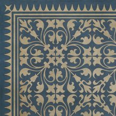 a blue rug with an intricate design on it