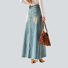 Welcome to our 2023 Spring-Summer Collection ââ‚?an eclectic mix of contemporary couture and nostalgic grunge! Step into the spotlight with our gypsy chic smoothed denim skirt ââ‚?a vogue staple for all the fashion-forward trendsetters.Why They're Your Next Summer StapleThe perfect balance between underground attitude and sophisticated style. this denim skirt will add a hint of grunge to any outfit. With its unique sanded damaged pattern and high waist fit. it's sure to turn heads.Key Highlights Denim Skirts Online, Womens Denim Skirts, Long Denim Skirt, Light Blue Denim, High Waisted Denim, Modern Fashion, Sophisticated Style, Couture Fashion, Denim Fashion