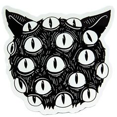 a black and white sticker with many cats'eyes on the back of it