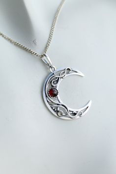 ITEM DESCRIPTION: The size of this circle pendant H 4 cm x W 3 cm. Weight - 4g. You can buy this necklace with a chain or without and with different stones. Jewelry will come to you in a gift box - ready for gift giving. I made this moon necklace of sterling silver, red garnet, and tiny labradorite. I think this color combination is very elegant and luxurious! The parcel will be sent 1-2 days after payment. Delivery usually takes 10-21 days. But in the period from December to February this may t Celestial Necklace With Large Round Pendant, Celestial Style Necklace With Large Round Pendant, Symbolic Moon Phase Round Pendant Necklace, Mystical Sterling Silver Moon Charm Jewelry, Symbolic Moon Charm Round Pendant Necklace, Symbolic Moon Charm Pendant Jewelry, Sterling Silver Sun And Moon Round Necklace, Spiritual Moon Phase Pendant Jewelry, Sterling Silver Round Necklace With Sun And Moon Design