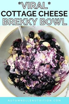 a bowl filled with blueberries and almonds