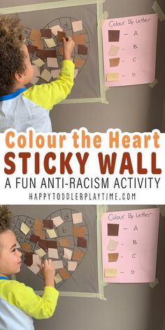 a young boy is painting the wall with sticky tape and paint it pink, brown and yellow