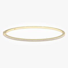 Discover understated luxury with this dainty 14k solid gold diamond bangle bracelet.  Its minimalist design features shimmering genuine diamonds, adding a touch of timeless elegance to your everyday style. Handcrafted with precision, this is a luxurious piece you'll treasure. Handmade  Solid Gold Natural Diamonds Diamond Ct weight 0.42 Bracelet Width 1.6mm Bracelet Height 2.1 mm 🛠 Your Sarah Elise piece is handcrafted with care! Ready-to-ship items go out within 3 business days. Made-to-order pieces typically take 7-10 business days to create. If you need something sooner, please contact us - we'll see if we can make it happen! For estimated shipping dates and tracking, check your Etsy account under 'Orders'. 🚐Orders under $100 are sent with USPS First Class Mail tracking; orders more th Minimalist Diamond Accented Bangle Tennis Bracelet, Minimalist Diamond Accents Tennis Bangle Bracelet, Minimalist Tennis Bracelet With Diamond Accents, Minimalist White Gold Everyday Luxury Bracelet, Minimalist Diamond Bangle Bracelet With Accents, Yellow Gold Minimalist Stackable Tennis Bracelet, Modern 14k Gold Bracelet With Brilliant Cut, Minimalist Stackable Yellow Gold Tennis Bracelet, Minimalist Yellow Gold Stackable Tennis Bracelet