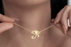 Eye Of Ra Necklace, Eye Of Horus Pendant, Egyptian Jewelry, Mythology Necklace, Spiritual Necklace, Eye Of Ra Charm, Evil Eye Necklace TO OUR VALUED CUSTOMERS ! Please take a look at our special catalog that we have prepared for you ! ▶ https://www.etsy.com/shop/MarryMinimalist ✔️ All products in our unique store are personalized. ( You can find our font list in the images ) D E T A I L S ✔️A lifetime silver CLEANING CLOTH is given as a GIFT along with the 925 Sterling Silver Necklace! ✔️ * Made to Order. * Handmade with Sterling %100 925K Sterling Solid Silver. * Choice of Gold Color: Gold, Rose Gold, Silver * Length: 14", 16", 18", 20", 22" * Ready to Ship in 1-3 Business Days * Free returns within 14 days from the order date. ✔️ 24/7 Friendly Customer Service, contact us for any questio Spiritual Necklace, Eye Of Ra, Egyptian Jewelry, Eye Of Horus, Evil Eye Necklace, Eye Necklace, Sterling Silver Necklace, Love Gifts, Makeup Accessories