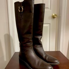 100% Authentic Classic Salvatore Ferragamo Riding Boot For Women With The Iconic Gancini Buckle Size 7us/37.5 Italy. In A Great Condition. Leather Has Been Taken Care Of Very Well. Designer Leather Boots With Horsebit Detail, Luxury Calf Leather Riding Boots, Calf Leather Riding Boots With Leather Lining, Luxury Riding Boots With Leather Sole, Calf Leather Boots With Horsebit Detail, Elegant Leather Boots With Horsebit Detail, Calf Leather Boots With Horsebit Detail And Round Toe, Elegant Boots With Horsebit Detail And Round Toe, Elegant Leather Riding Boots