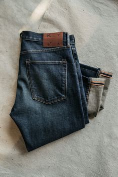 The Scissors Slim tapered - Jett 14oz Selvedge– HIROSHI KATO | Official Online Store Faded Selvedge Denim Jeans, Rugged Selvedge Dark Wash Bottoms, Rugged Dark Wash Selvedge Bottoms, Recycled Denim Selvedge Jeans In Washed Blue, Washed Blue Selvedge Rigid Denim Bottoms, Washed Blue Selvedge Denim Jeans, Washed Blue Selvedge Jeans In Recycled Denim, Selvedge Washed Blue Denim Jeans, Washed Blue Selvedge Denim Bottoms