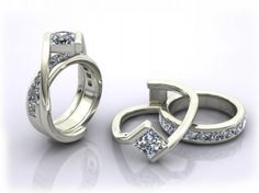 two white gold wedding rings with princess cut diamonds on the sides and an open diamond band