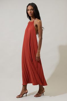 The Wenden Halter Neck Pleated Midi Dress is calling with sweet and new season energy. Fully pleated this midi dress shapes a halter neck with a low cut back. It has a loose fit and it can be paired with strappy heels. - Halter - Pleated- Lined- Sleeveless- Comes in 2 colorsSize + Fit - Model is 5'9" and wearing size XS- Measurements taken from size S - Chest: 18"- Length: 48 1/4" Fabric Self: 100% Polyester, Lining: 97% Polyester 3% Spandex Style Number STD14553 Spring Pleated Halter Neck Midi Dress, Summer Pleated Bodice Halter Dress, Vici Halter Top Pleated Dress, Vacation V-neck Pleated Midi Dress, Summer Halter Dress With Gathered Neckline, Midi Length, Pleated Maxi, Pleated Maxi Dress, Pleated Midi Dress, Dress Shapes