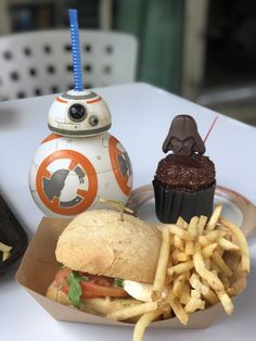 a star wars themed sandwich and fries on a table