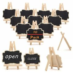 an assortment of wooden eases with chalkboard signs on them and the words'10 pack'written in black