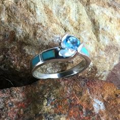 This beautiful Sterling Silver Ring Set, as part of the Arizona Blue Collection features Kingman Turquoise with a Blue Topaz. Engagement Ring Width: Top 5/8"; Shank 1/8" Band Width: 1/4"; Shank 1/8" The ring is designed by David Rosales, one of the finest contemporary Southwest Artists in the world. He is the founder and co-owner of Supersmiths, Inc. of Gallup, NM. Each ring is custom made and carries a lifetime guarantee. Buffalo Jewelry, Contemporary Southwest, Spiny Oyster Jewelry, Lapis Jewelry, Blue Topaz Engagement Ring, Black Arrow, Silver Belt Buckle, Sterling Silver Rings Set, Topaz Engagement Ring