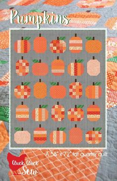 an orange quilt with pumpkins on it and the words pumpkins written in white