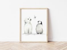 two polar bears are standing next to each other in front of a wall with a white background