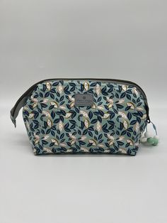 "Perfect for that special person in your life, for a gift or for yourself. Finished size 118.5\" long by 4\"wide X 5\"tall.  The bag is generous and would be perfect for carrying personal items in a suitcase, briefcase, or backpack.  Made from Pretty Summer Flower fabric.  Top has wire frames that holds the bag open while using.   Very nice bag, and would have many uses.  Perfect for cosmetics, computer accessories, threads, and small sewing accessories. Wash in cold water, and set to dry-do not Bingo Bag, Small Sewing, Quilted Table Toppers, Flower Fabric, Fusible Interfacing, Star Pictures, Mug Rug, Star Ornament, Summer Fabrics