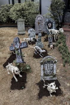 halloween yard decorations with skeletons and tombstones