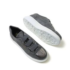 Revealing "Luiz X Urban Elegance." Draped in a refined grey, these slip-ons encapsulate city sophistication. The contrast of white soles enhances their modern allure, while the distinct toe cap adds a touch of distinguished flair. Key Features: Sleek Grey Finish: The epitome of metropolitan style. Contrasting White Soles: Creating a crisp, contemporary edge. Metal Toe Cap: Offering a gleaming point of differentiation. Orthopedic Comfort: A promise of cushioned support with each step. 1.5-Inch Bo Sneakers Looks, Comfortable Sneakers, Us Man, Men Looks, Slip On Sneakers, Slip Ons, Modern Luxury, Top Sneakers, Porter