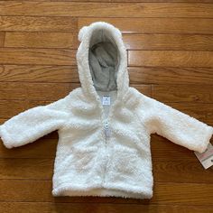 Carters Sherpa Jacket- Nwt - Color Ivy And Gray And White Striped Inside Hood. Perfect Condition, Size 9 Months White Hooded Jacket With Fleece Lining, White Fleece-lined Hooded Jacket, White Long Sleeve Hooded Jacket With Fleece Lining, White Fleece Hooded Jacket For Cold Weather, Hooded White Fleece Jacket For Cold Weather, Cozy White Fleece Hooded Jacket, White Hooded Jacket With Fleece Lining For Cold Weather, Warm White Fleece Outerwear, Winter Long Sleeve Outerwear For Playtime