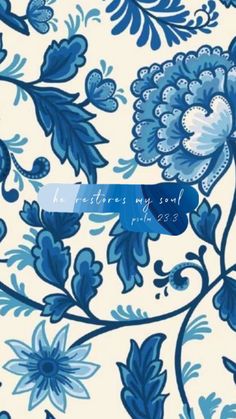 a blue and white flower pattern with the words he restores my soul on it