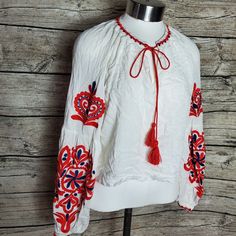 Forever 21 White Peasant Boho Top Shirt Blouse Floral Embroidered Puff Sleeve S. Pit To Pit Approx: 20 Inches Right Shoulder To Bottom Approx: 18 Inches Z14 Red Long-sleeve Peasant Top For Spring, Red Embroidered Top For Spring, Traditional Red Spring Top, Traditional Red Top For Spring, Summer Peasant Top With Multicolor Embroidery And Long Sleeves, Long Sleeve Peasant Top With Multicolor Embroidery For Summer, Casual Peasant Top With Multicolor Embroidery For Spring, Casual Multicolor Embroidered Peasant Top For Spring, Bohemian Spring Blouse From Forever 21