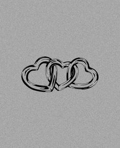 two interlocked hearts on a gray background