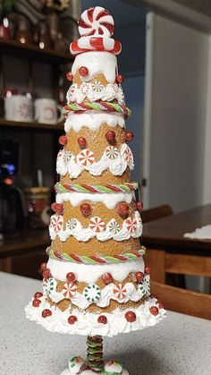 a christmas tree made out of cookies and candy canes