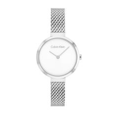 Enhance your everyday look with the understated elegance of this ladies' Calvin Klein silver-toned watch with a mesh bracelet and white dial. The minimalist white sunray dial features silver-toned hands. 28.0mm stainless steel case with mineral crystal Japanese quartz movement keeps accurate time. The stainless steel mesh bracelet secures with a sliding buckle clasp. Water resistant to 30 meters, this watch includes a 2-year limited manufacturer warranty. We are an authorized Calvin Klein dealer Minimalist White Everyday Watch, White Minimalist Everyday Watch, Minimalist Silver Analog Watch, White Minimalist Watch For Formal Occasions, Timeless White Watch With Stainless Steel Clasp, Calvin Klein Watch, Mens Highlights, Ck Calvin Klein, Mesh Bracelet