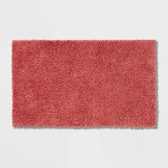 a red rug on a white background