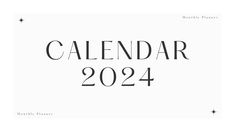 a white calendar with black lettering on the front and back of it's cover