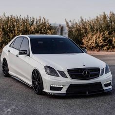 a white car parked in a parking lot