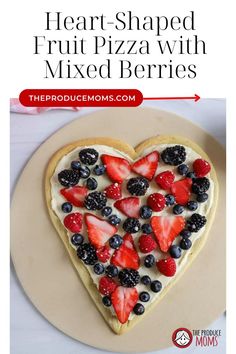 a heart shaped fruit pizza with mixed berries on top and the title overlay reads, heart shaped fruit pizza with mixed berries