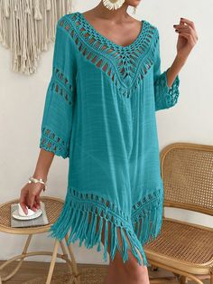 This beautiful Boh Fringe Hem Crochet Cover Up Dress features a plain pattern and exquisite cut-out and fringe detailing. It also has a flattering V-neckline and three-quarter length sleeves. The dress is designed to have a regular fit and is made with a slight stretch, perfect for comfort and movement. Crafted with a woven fabric blend of 65% viscose and 35% polyester, this dress feels luxurious and elegant. To keep it in pristine condition, it's best to hand wash or have it professionally dry cleaned. The semi-sheer material adds a touch of allure to this must-have piece. Size US Bust Cuff Length Sleeve Length S 4 40.2 13.4 32.3 18.5 M 6 41.7 13.9 33.1 18.9 L 8/10 44.1 14.6 33.9 19.4 Ships in 4-6 days Join our mailing list for a 20% off your first order, sign up on the main page Crochet Cover Up Dress, Crochet Cover, Beach Coverup Dress, Crochet Cover Up, Rope Design, Women's Cover Up, Cover Ups, Sheer Material, Beachwear For Women