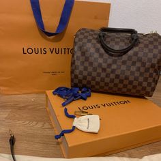 Lv Speedy Bandoulire 30 Material: Damier Ebene 11.81 X 8.27 X 6.69 Inches (Length X Height X Width) L 11.8 X H 8.2 X W 6.6 Inches Damier Ebene Coated Canvas Smooth Cowhide-Leather Trim Textile Lining Gold-Color Hardware 2 Handles For Hand Or Elbow Carry It Comes With Removable, Adjustable Leather Strap (Drop: Min. 48 Cm/18.9 Inches, Max. 55 Cm/21.7 Inches) For Shoulder Or Cross-Body Carry. Strap For Louis Vuitton Speedy, Speedy 30 Louis Vuitton Bag, Lv Speedy Bandouliere 30, Lv Speedy Bandouliere, Speedy Bandouliere 30, Lv Speedy, Speedy Bandouliere, Damier Ebene, Louis Vuitton Speedy Bag