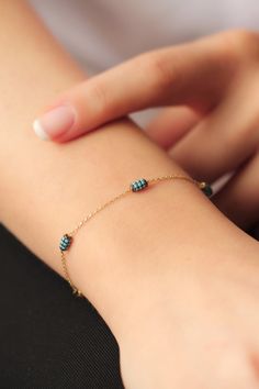 "Gold Turquoise Bracelet, Good Luck Charm, Gold Turquoise Bracelet, Row of Turquoise Stone Bracelet, Dainty Gold Bracelet, Dainty Bracelet Turquoise Bracelet is presence will make a difference on your wrist with its special design. It is suitable for daily use as well as for special occasions. More details; Turquoise Gold Bracelet is 1.90 gr in weight and 17 cm in length. Your products will be shipped with free shipping UPS express within 1-3 business days. There may be +/- 0.15 change in gram i Turquoise Evil Eye Bracelet With Round Beads, Turquoise Evil Eye Bracelet With Round Beads As Gift, Turquoise Jubilee Bracelet, Turquoise Bracelets For Gift, Turquoise Jubilee Bracelet Jewelry Gift, Dainty Turquoise Bracelet, Turquoise Stone Bracelet, Bee Bracelets, Dainty Gold Bracelet