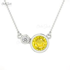 Description The round Yellow Sapphire looks stunning, especially when paired with a magnificent round diamond on the side. This necklace, made of gleaming 14K pure gold, provides the right touch of glitz to your ensemble. The stones' bezel setting adds a touch of sophistication to this solitaire Yellow Sapphire. Product Details SKU CJ-N-1271-YS Metal 14K Solid Gold Chain type Cable Chain Chain length 14+2 inch Closing mechanism Spring Ring Product dimension 16 inch x 13.72mm x 3.13mm Birthstone Round Cubic Zirconia Solitaire Necklace With Gemstone, Round Solitaire Necklace With Cubic Zirconia Gemstone, Round Solitaire Necklace With Cubic Zirconia, Sterling Silver Round Diamond Birthstone Necklace, Sterling Silver Diamond Birthstone Necklace, Sterling Silver Diamond Necklace With Birthstone, Diamond White Solitaire Necklace With Round Gemstone, Diamond Solitaire Necklace With Birthstone, Birthstone Necklace With Diamond Accents