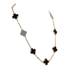 This Van Cleef & Arpels Vintage Alhambra 10 Motif Necklace is in 18k gold with 10 onyx motifs and a lobster claw clasp.Origin: FranceCondition: New and never wornAccompanied by: VCA green jewelry box, box and authenticity card Measurements: 16.5" x .5" Luxury Black Necklace For Formal Occasions, Luxury 14k Gold Jewelry With Black Enamel, Luxury Yellow Gold Necklaces With Black Enamel, Luxury Black Hallmarked Jewelry, Luxury Black Jewelry For Formal Occasions, Elegant Black Enamel 14k Gold Necklace, Elegant Yellow Gold Necklaces With Black Enamel, Elegant 14k Gold Necklace With Black Enamel, Elegant Yellow Gold Necklace With Black Enamel